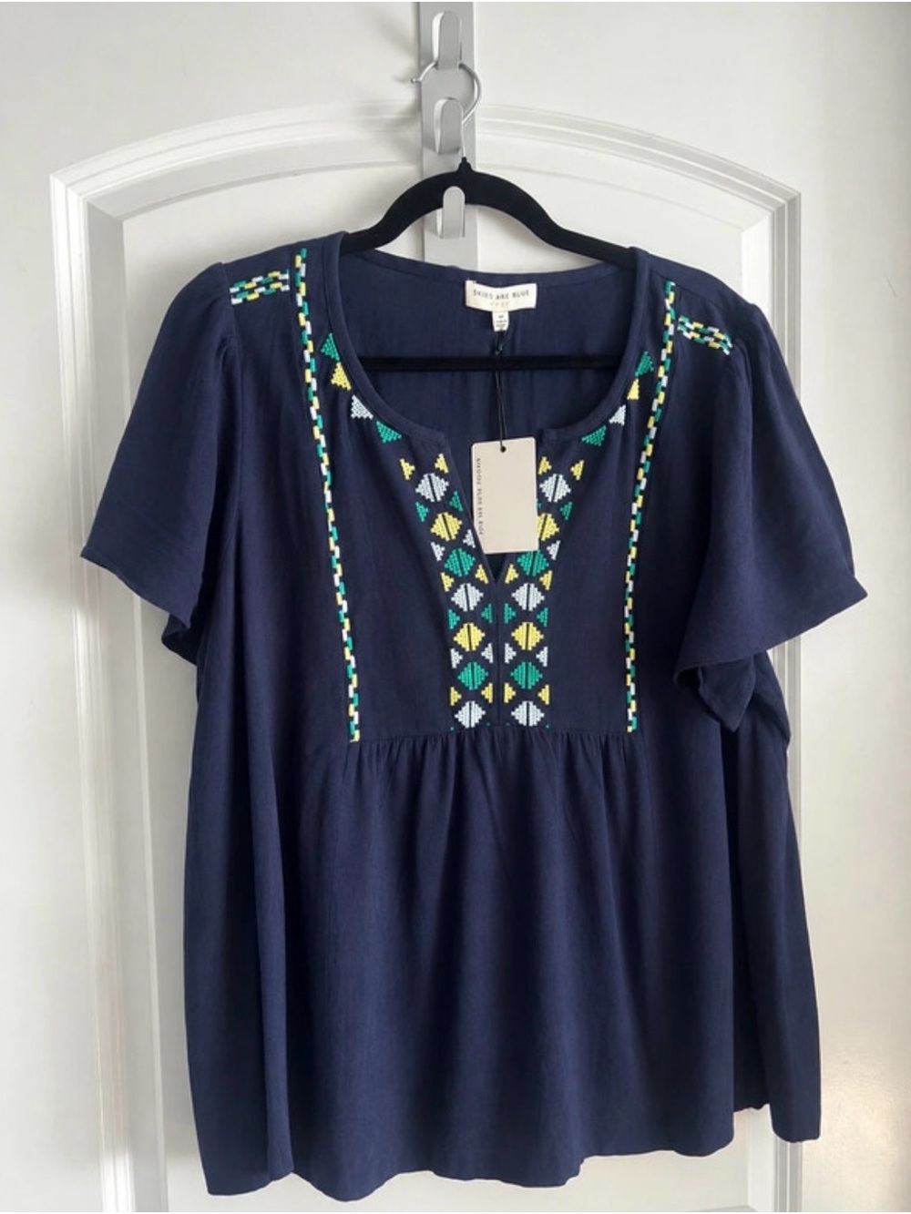 Skies Are Blue Navy Top with Geometric Embroidery